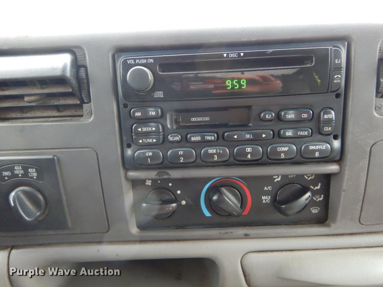 image for item DE6030 2001 Ford F350 Super Duty XLT Crew Cab flatbed pickup truck