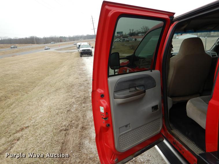 image for item DE6030 2001 Ford F350 Super Duty XLT Crew Cab flatbed pickup truck