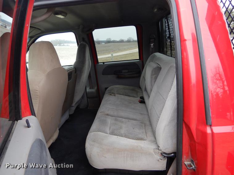 image for item DE6030 2001 Ford F350 Super Duty XLT Crew Cab flatbed pickup truck