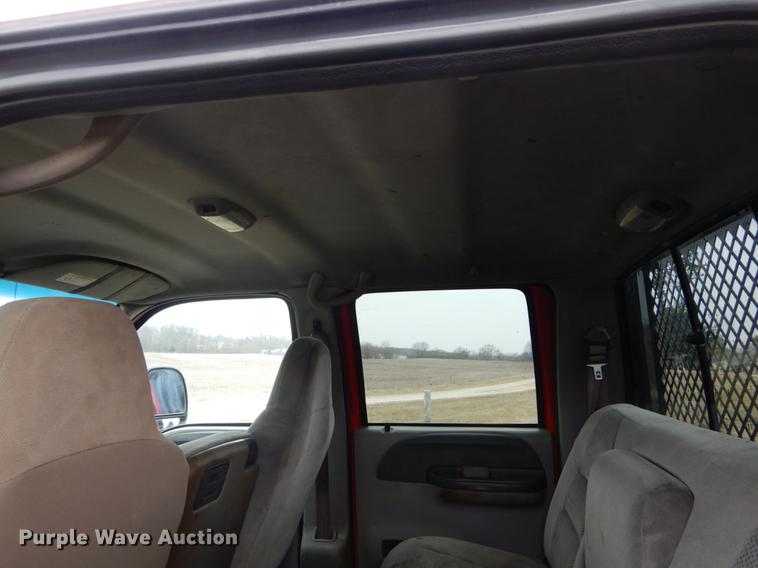 image for item DE6030 2001 Ford F350 Super Duty XLT Crew Cab flatbed pickup truck