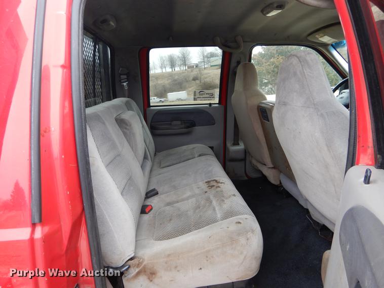 image for item DE6030 2001 Ford F350 Super Duty XLT Crew Cab flatbed pickup truck