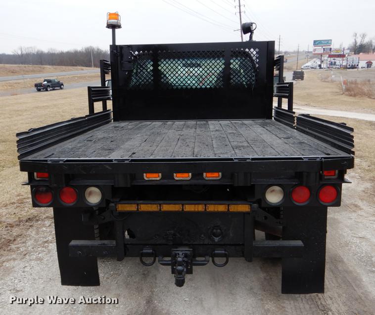 image for item DE6031 2004 Ford F350 Super Duty XL flatbed pickup truck