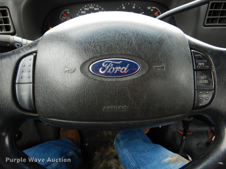 image for item DE6031 2004 Ford F350 Super Duty XL flatbed pickup truck