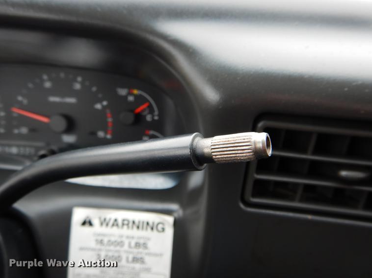 image for item DE6031 2004 Ford F350 Super Duty XL flatbed pickup truck