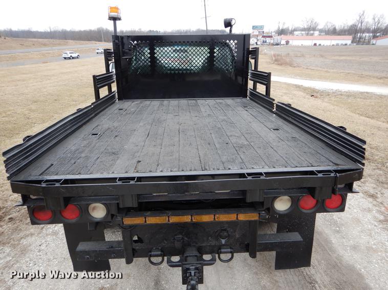 image for item DE6031 2004 Ford F350 Super Duty XL flatbed pickup truck