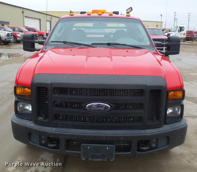 image for item DF7665 2010 Ford F350 Super Duty Crew Cab flatbed pickup truck