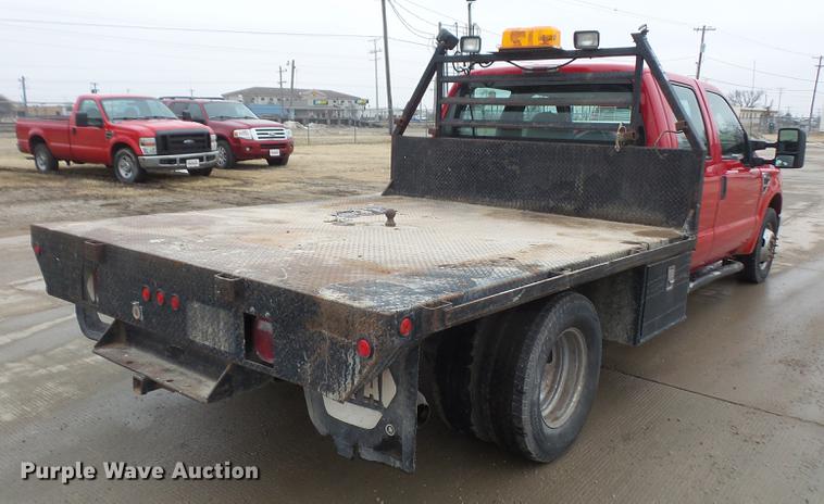 image for item DF7665 2010 Ford F350 Super Duty Crew Cab flatbed pickup truck