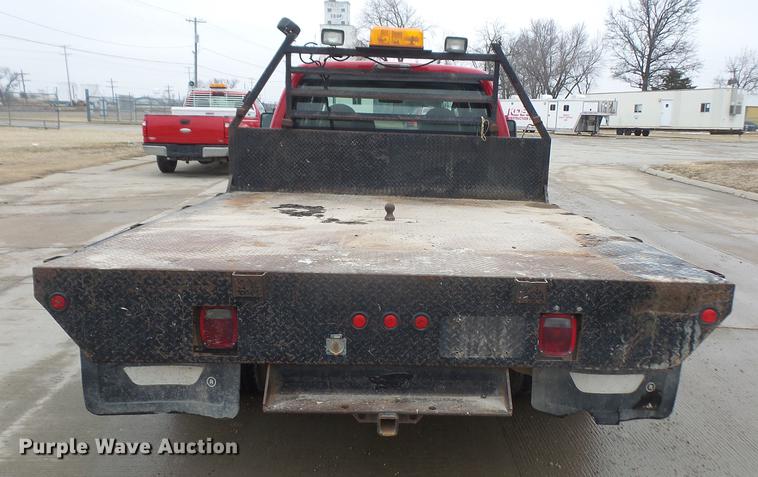 image for item DF7665 2010 Ford F350 Super Duty Crew Cab flatbed pickup truck