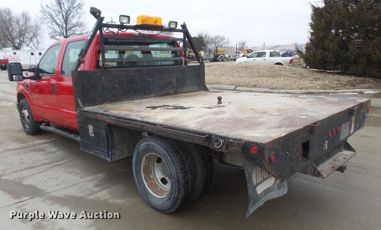 image for item DF7665 2010 Ford F350 Super Duty Crew Cab flatbed pickup truck