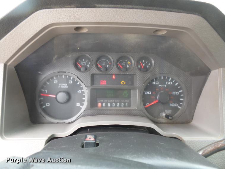 image for item DF7665 2010 Ford F350 Super Duty Crew Cab flatbed pickup truck