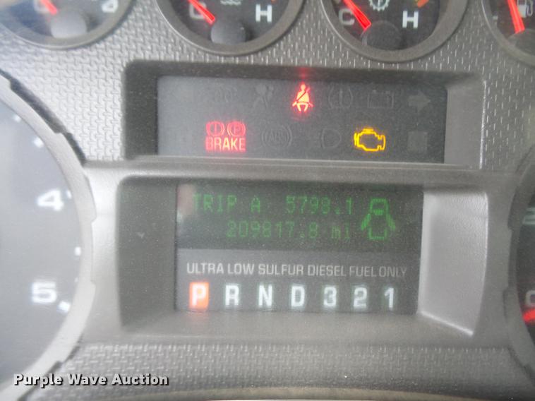 image for item DF7665 2010 Ford F350 Super Duty Crew Cab flatbed pickup truck