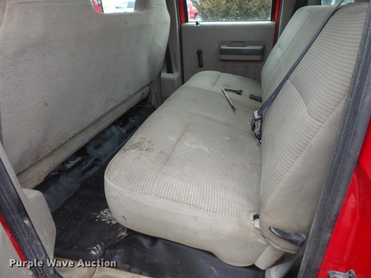 image for item DF7665 2010 Ford F350 Super Duty Crew Cab flatbed pickup truck