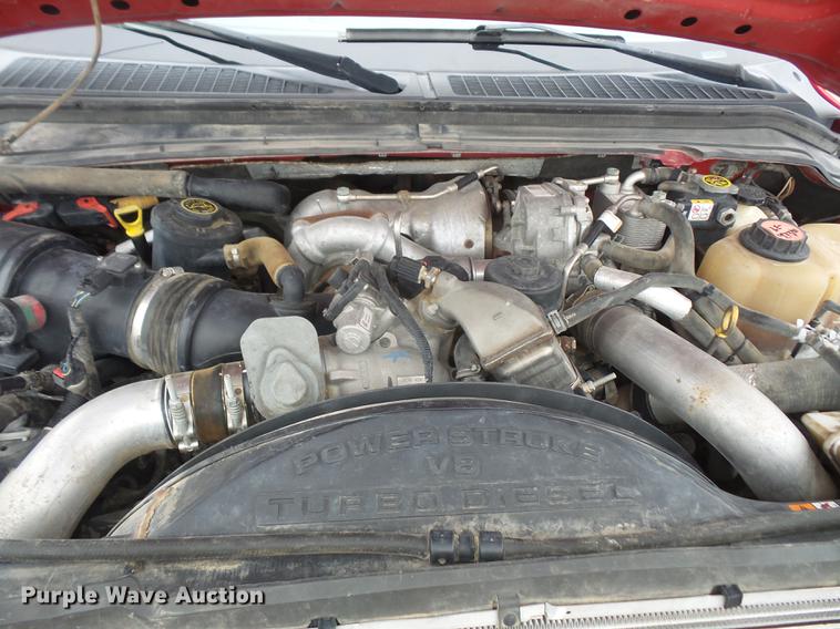 image for item DF7665 2010 Ford F350 Super Duty Crew Cab flatbed pickup truck