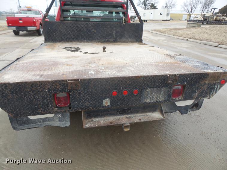image for item DF7665 2010 Ford F350 Super Duty Crew Cab flatbed pickup truck