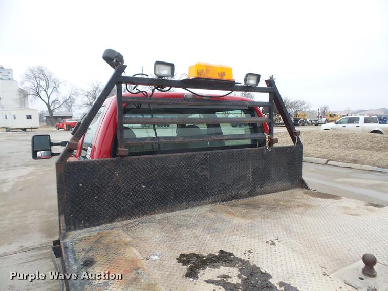 image for item DF7665 2010 Ford F350 Super Duty Crew Cab flatbed pickup truck