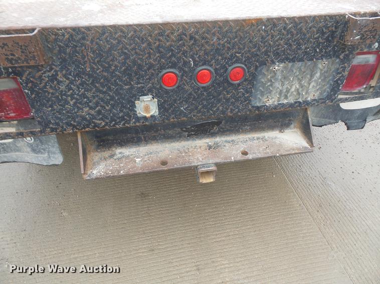 image for item DF7665 2010 Ford F350 Super Duty Crew Cab flatbed pickup truck