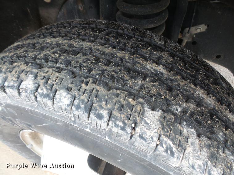 image for item DF7665 2010 Ford F350 Super Duty Crew Cab flatbed pickup truck