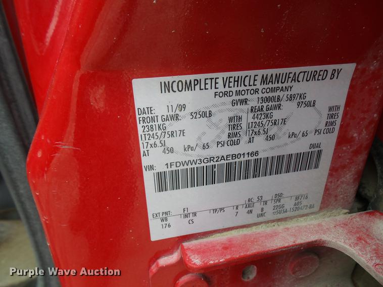 image for item DF7665 2010 Ford F350 Super Duty Crew Cab flatbed pickup truck