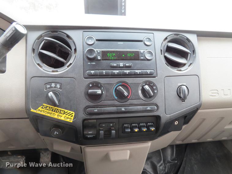 image for item DG3888 2008 Ford F550 Super Duty XL Crew Cab flatbed pickup truck
