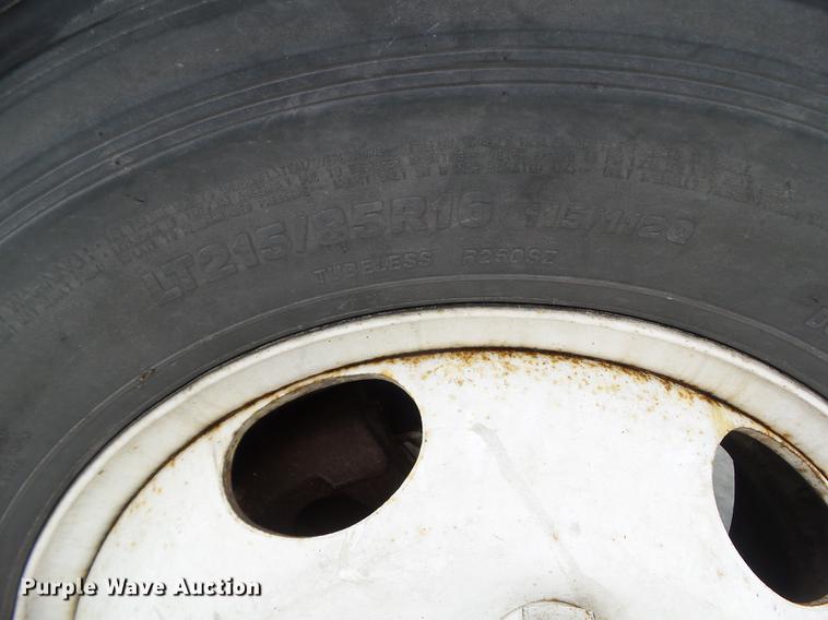 image for item EM9096 2010 Isuzu NPR truck cab and chassis