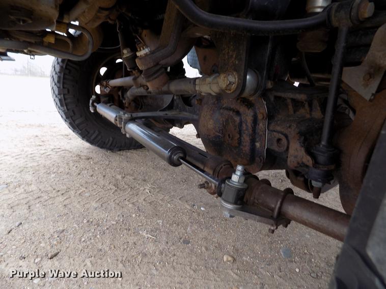 image for item FH9064 2005 Ford F350 Super Duty Crew Cab flatbed pickup truck