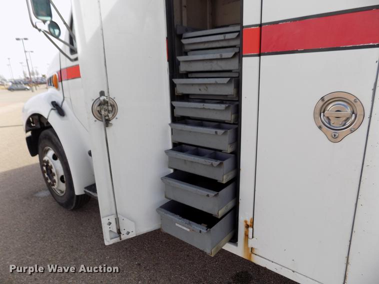 image for item FH9166 2003 Sterling Acterra service truck with crane