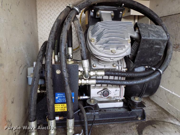 image for item FH9166 2003 Sterling Acterra service truck with crane