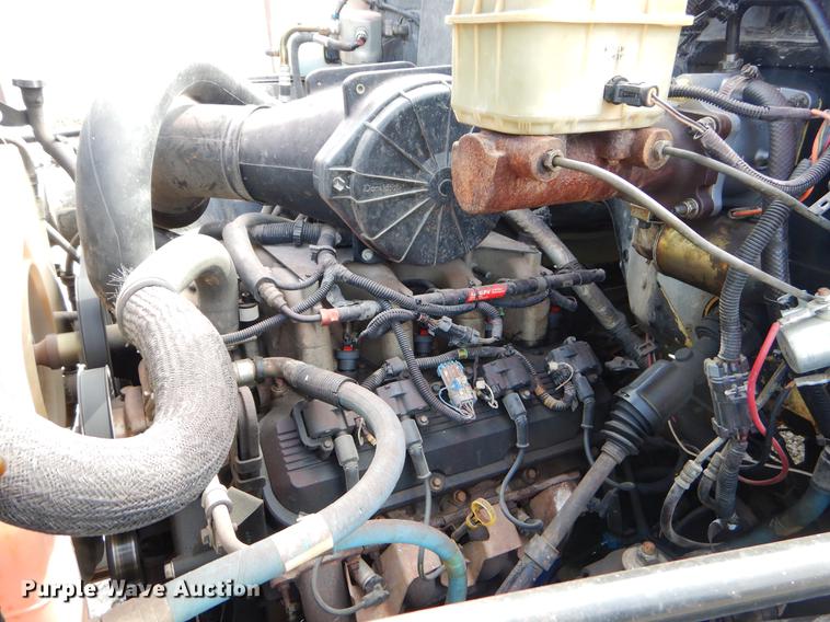 image for item FQ9669 2002 GMC C6500 flatbed truck