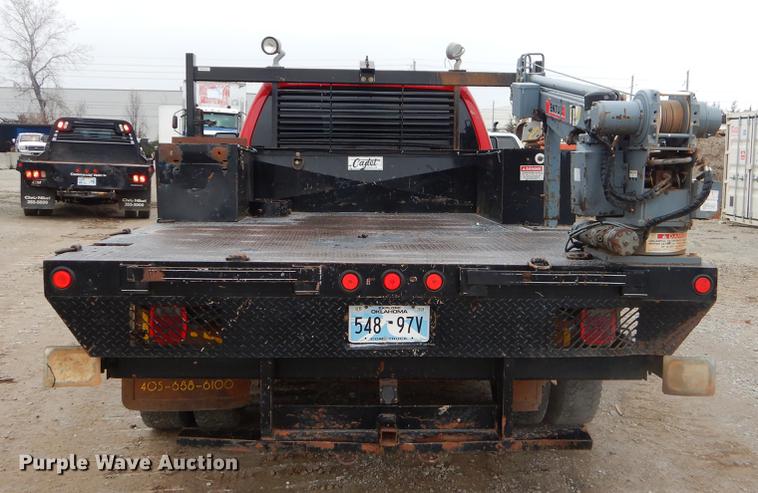 image for item FQ9707 2011 Ford F450 Super Duty Crew Cab flatbed truck with crane