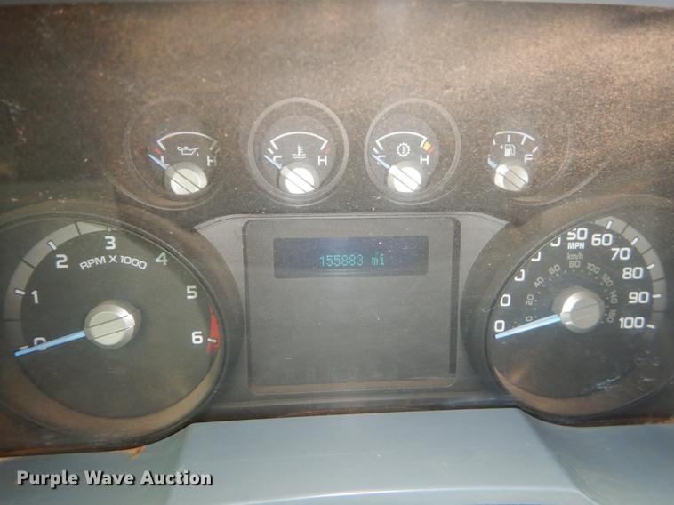 image for item FQ9707 2011 Ford F450 Super Duty Crew Cab flatbed truck with crane