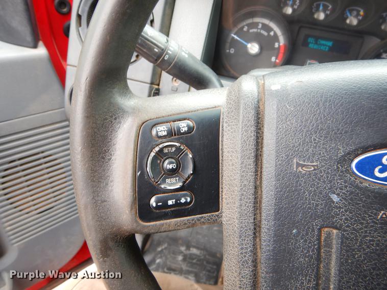 image for item FQ9707 2011 Ford F450 Super Duty Crew Cab flatbed truck with crane