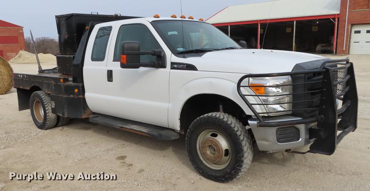 image for item L1491 2012 Ford F350 Super Duty XL SuperCab flatbed pickup truck
