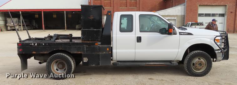 image for item L1491 2012 Ford F350 Super Duty XL SuperCab flatbed pickup truck