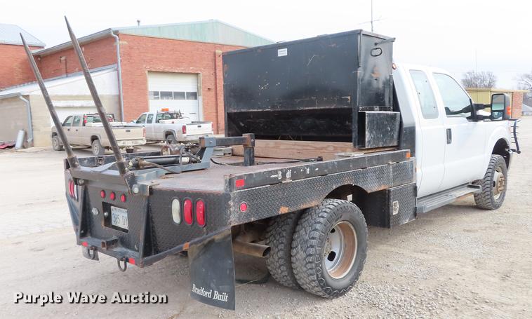 image for item L1491 2012 Ford F350 Super Duty XL SuperCab flatbed pickup truck