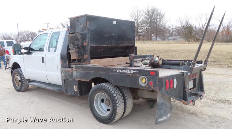 image for item L1491 2012 Ford F350 Super Duty XL SuperCab flatbed pickup truck