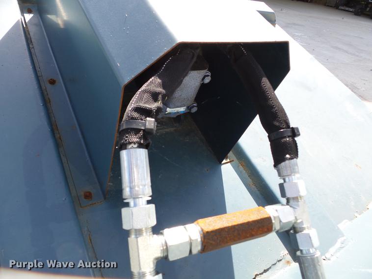 image for item CD9574 Paladin Racoon skid steer brush mower