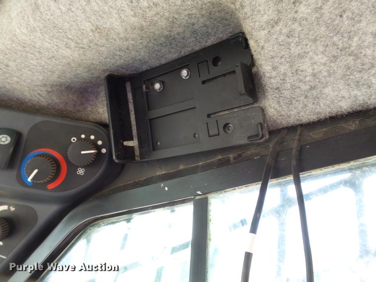 image for item CD9575 2013 John Deere 333D skid steer