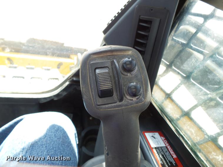 image for item CD9575 2013 John Deere 333D skid steer