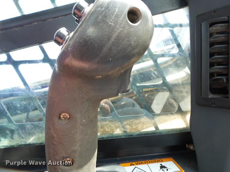 image for item CD9575 2013 John Deere 333D skid steer