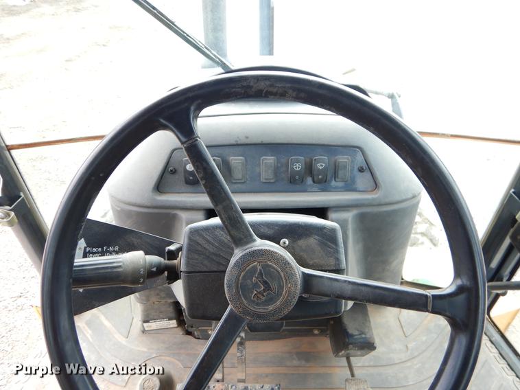 image for item FQ9585 2012 John Deere 310J backhoe