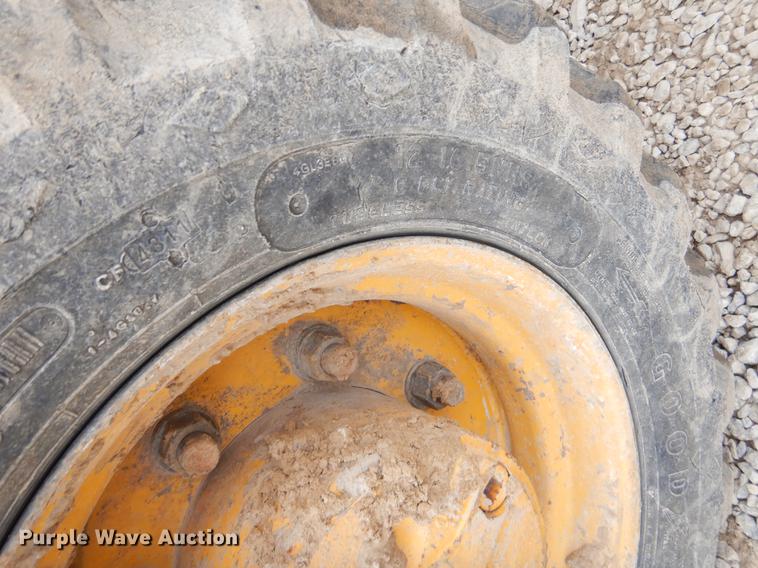 image for item FQ9585 2012 John Deere 310J backhoe