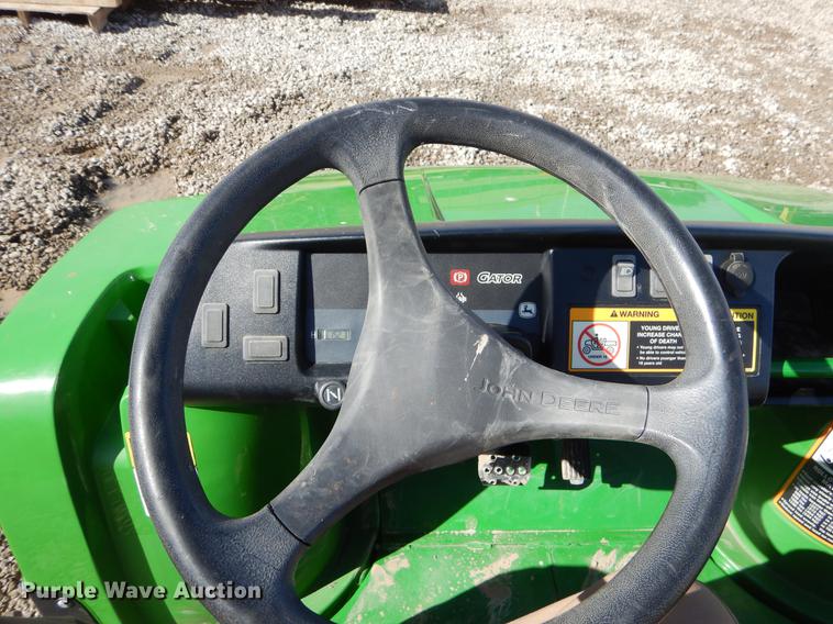 image for item FQ9588 2015 John Deere Gator TX utility vehicle