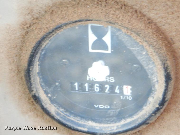 image for item FQ9607 1994 John Deere 670B motor grader