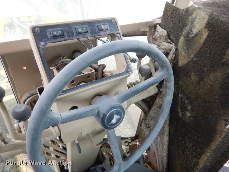 image for item FQ9610 1997 John Deere 670CH motor grader