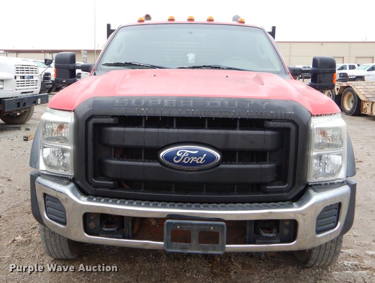 image for item FQ9707 2011 Ford F450 Super Duty Crew Cab flatbed truck with crane