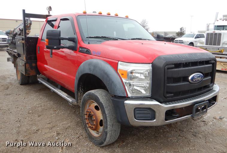 image for item FQ9707 2011 Ford F450 Super Duty Crew Cab flatbed truck with crane