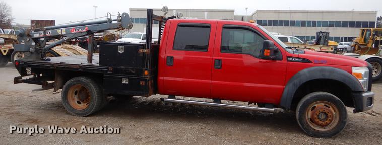 image for item FQ9707 2011 Ford F450 Super Duty Crew Cab flatbed truck with crane