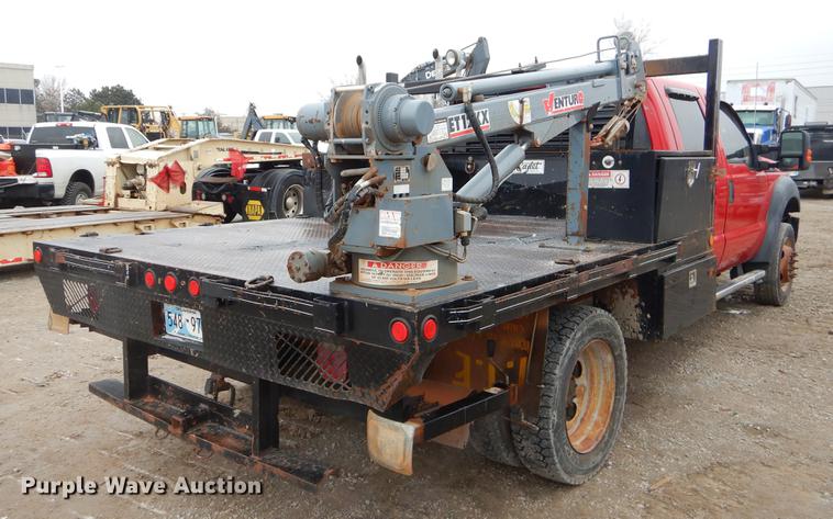 image for item FQ9707 2011 Ford F450 Super Duty Crew Cab flatbed truck with crane