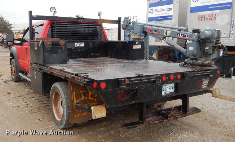 image for item FQ9707 2011 Ford F450 Super Duty Crew Cab flatbed truck with crane