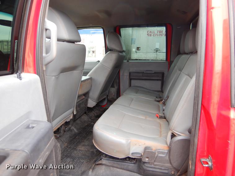 image for item FQ9707 2011 Ford F450 Super Duty Crew Cab flatbed truck with crane